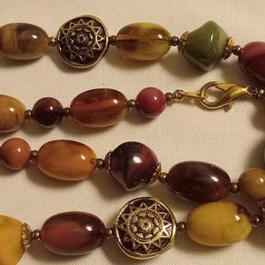 Beautiful 25 inch heavy glass bead necklace.